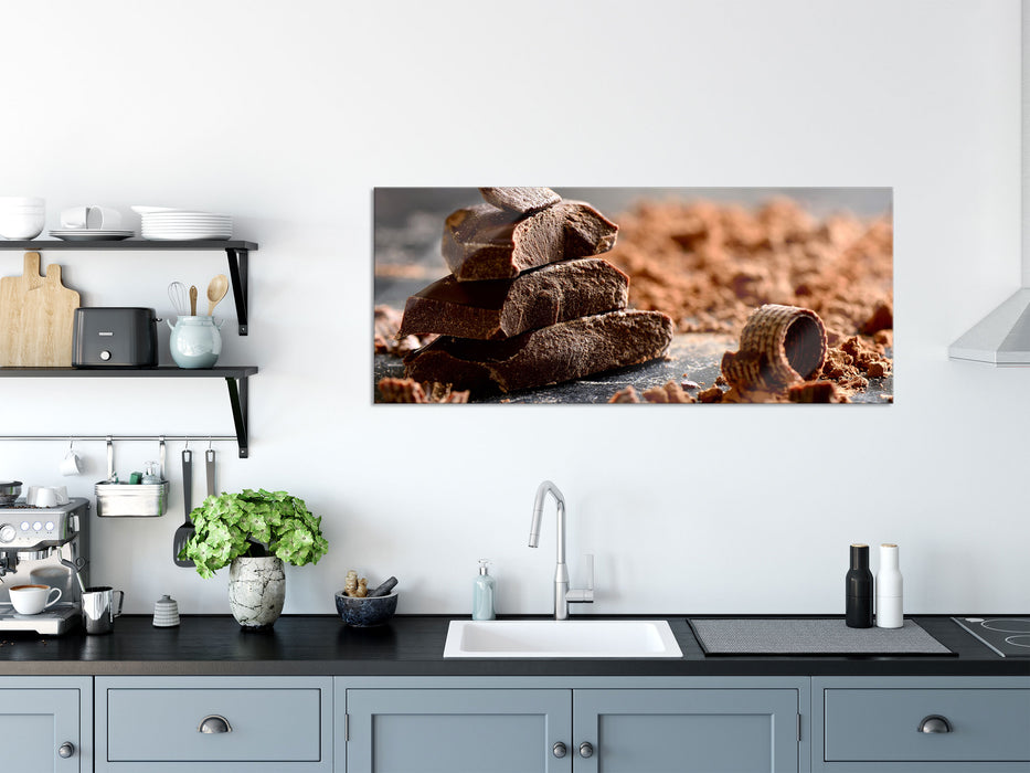 Dunkle Schokoladenraspeln, Glasbild Panorama