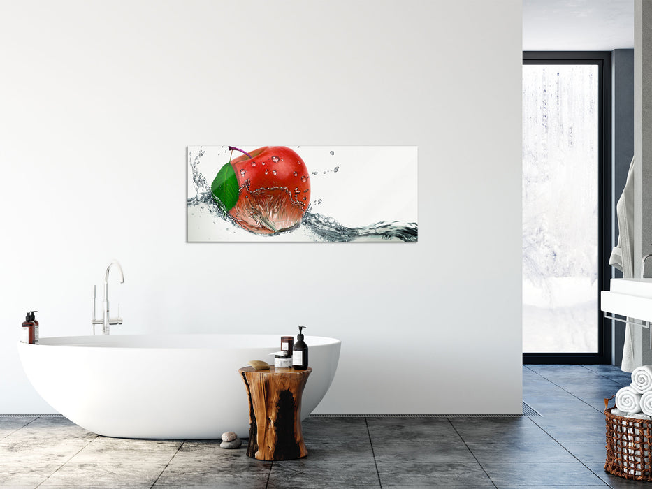 Köstlicher Apfel fällt ins Wasser, Glasbild Panorama