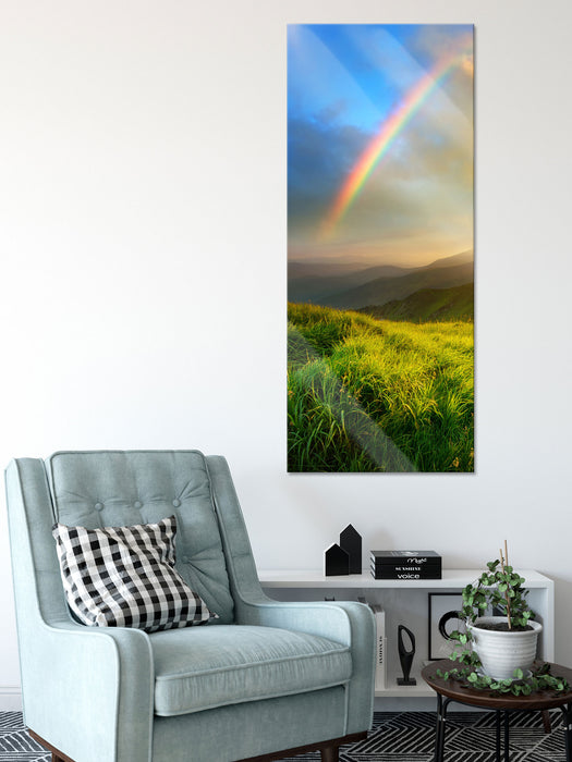 Berge mit Regenbogen am Himmel, Glasbild Panorama