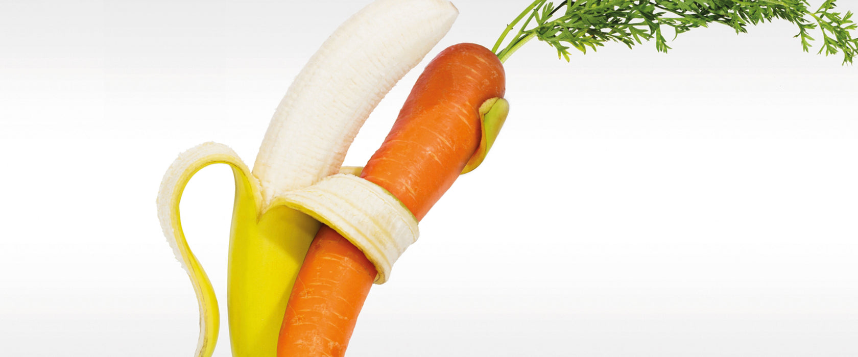 Tanz von Banane und Mohrrübe, Glasbild Panorama