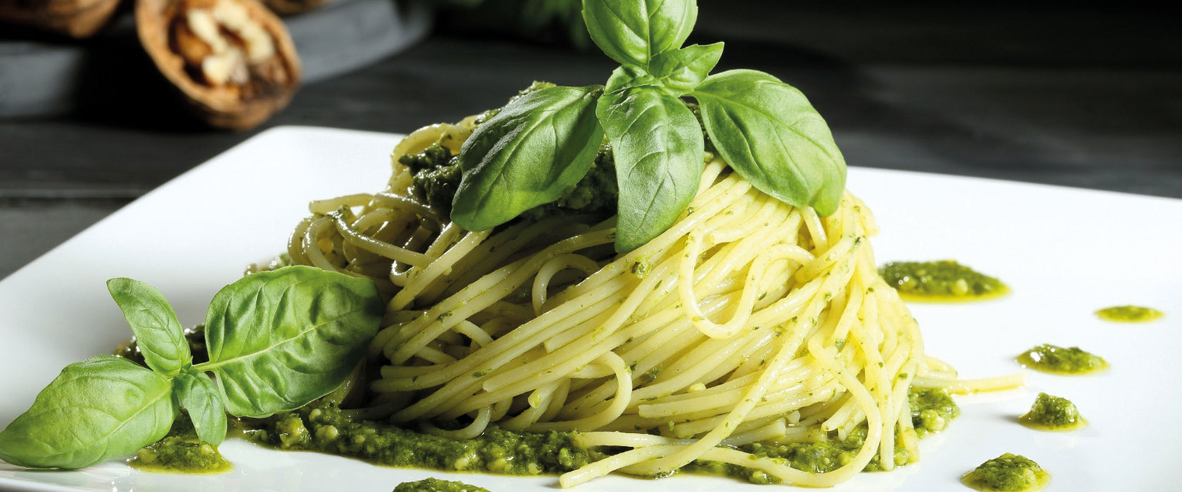 Spaghetti mit grünem Pesto, Glasbild Panorama