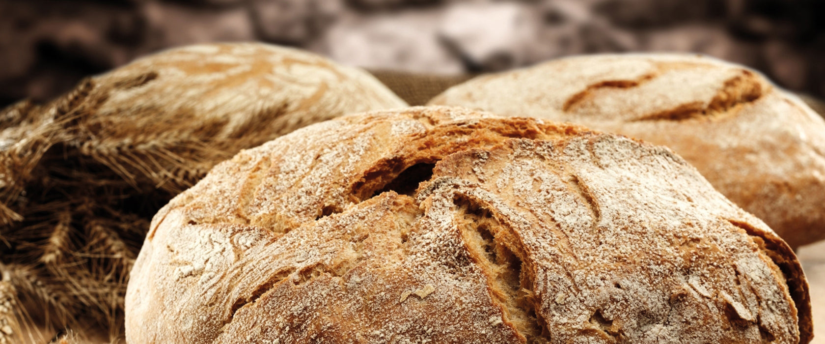 Frisch gebackenes Brot, Glasbild Panorama