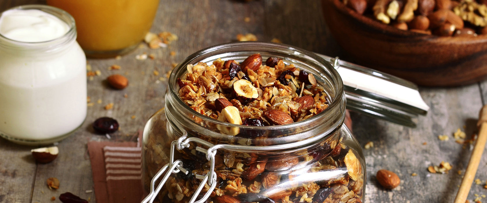 Honig Müsli im Glas, Glasbild Panorama