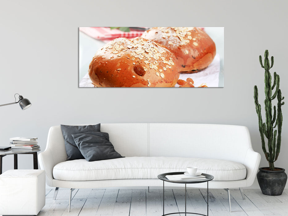 Süße Rosinenbrötchen, Glasbild Panorama