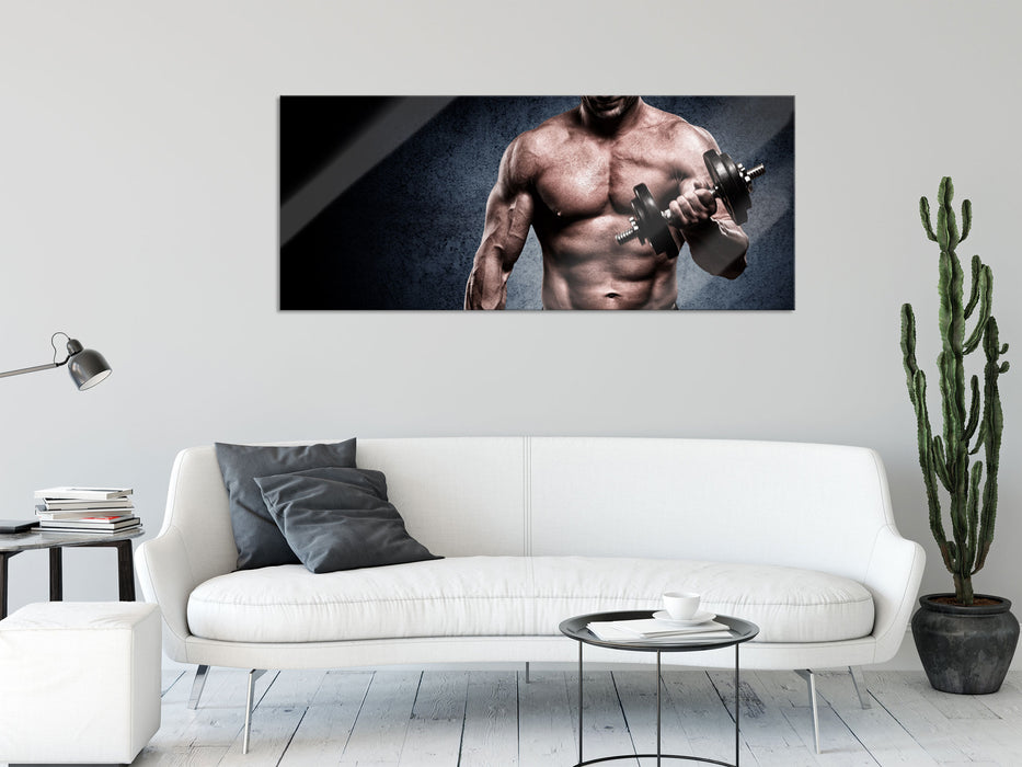 Starker Bodybuilder mit Hantel, Glasbild Panorama