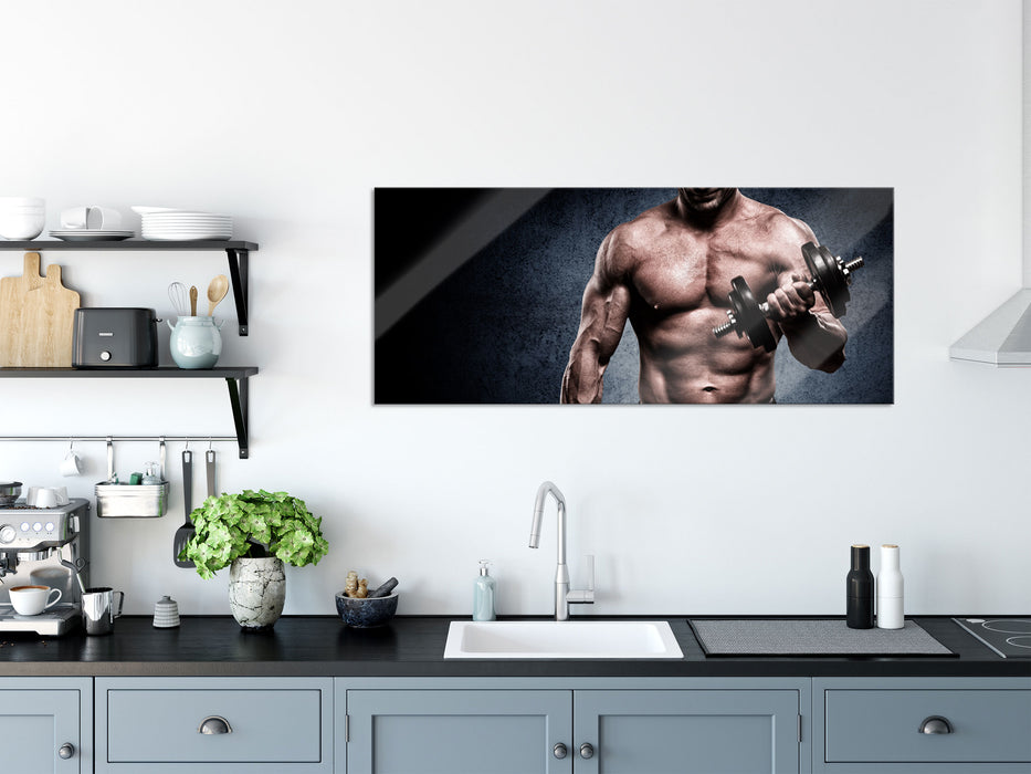 Starker Bodybuilder mit Hantel, Glasbild Panorama