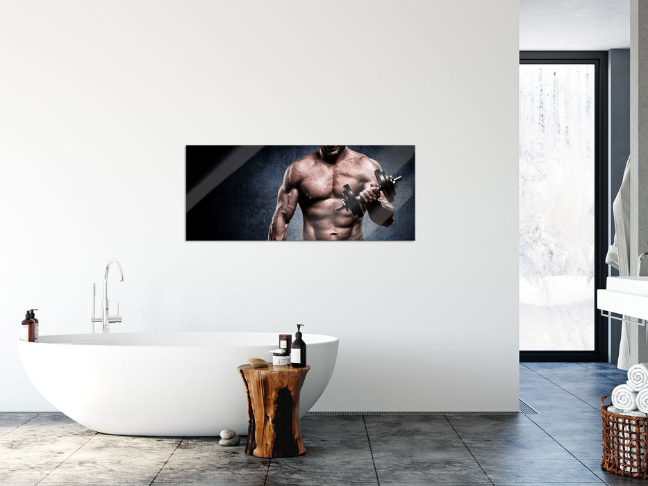 Starker Bodybuilder mit Hantel, Glasbild Panorama