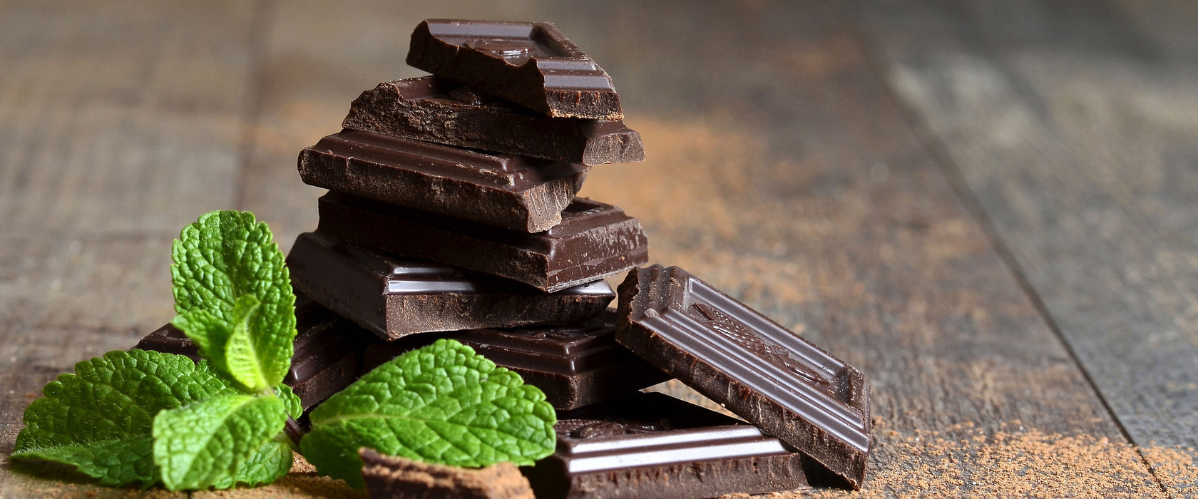 Schokoladenstücke, Glasbild Panorama