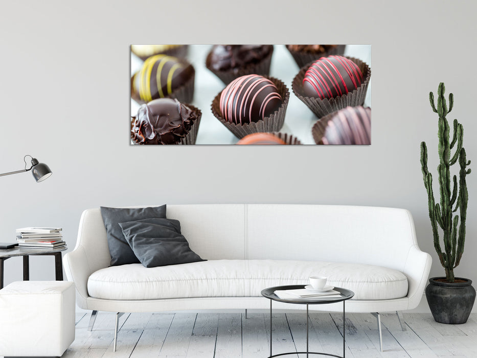 Süße Pralinen, Glasbild Panorama