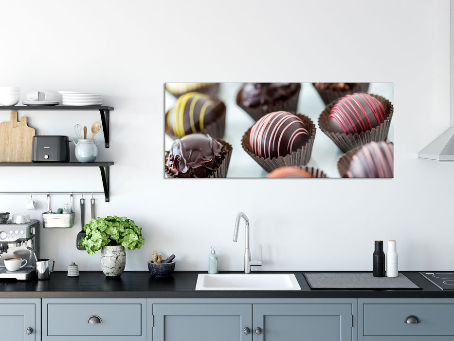 Süße Pralinen, Glasbild Panorama