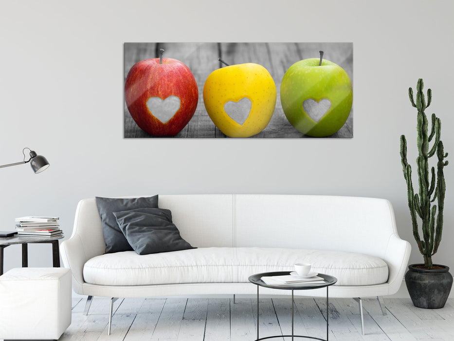 Herzäpfel auf Holztisch, Glasbild Panorama