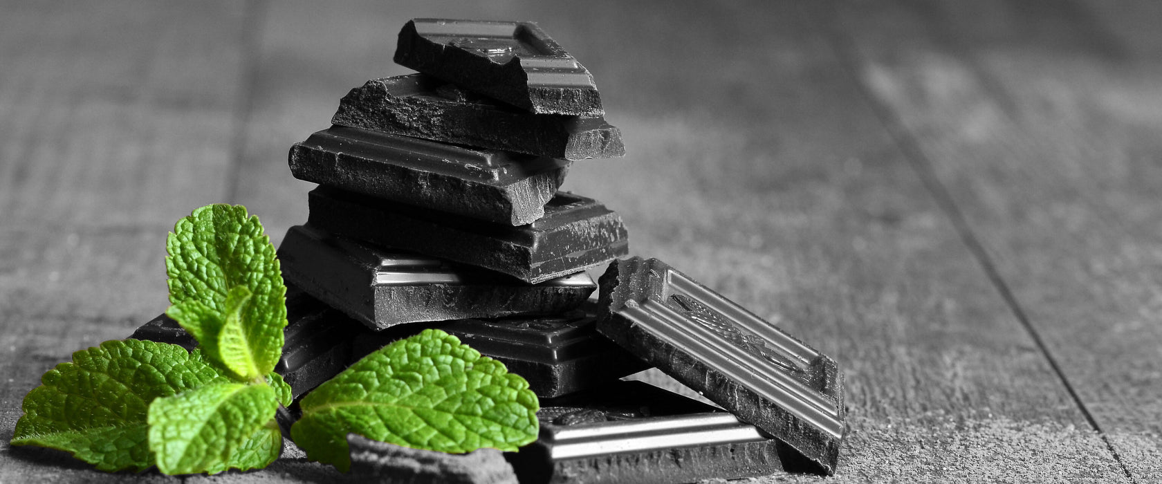 Pfefferminzschokolade in Stücken, Glasbild Panorama