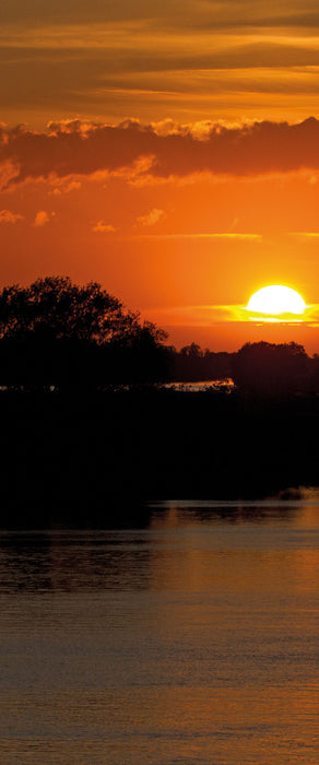 Sonnenuntergang über Fluss, Glasbild Panorama