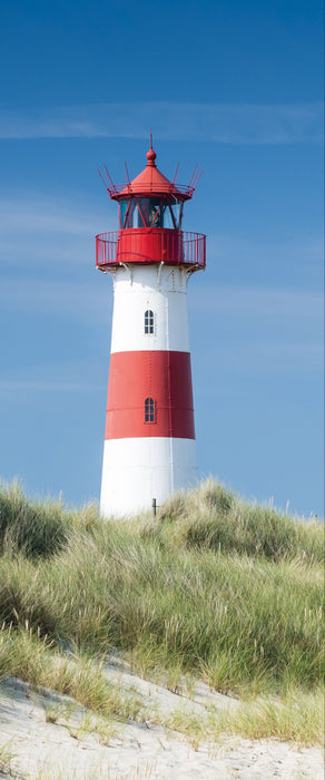 Leuchtturm hinter Dünen, Glasbild Panorama