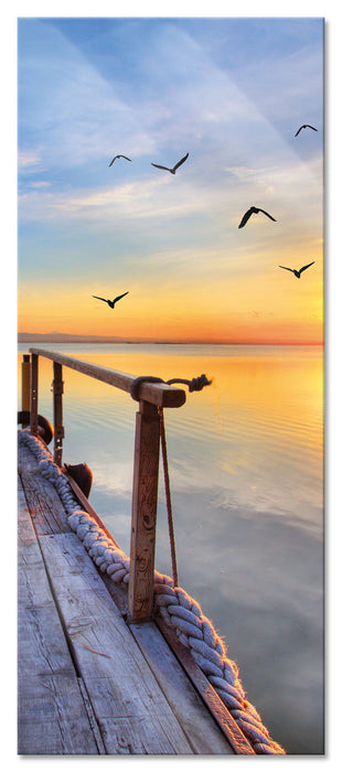 Pixxprint Steg mit Möwen bei Sonnenuntergang, Glasbild Panorama