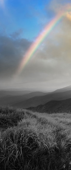 Berge mit Regenbogen am Himmel, Glasbild Panorama