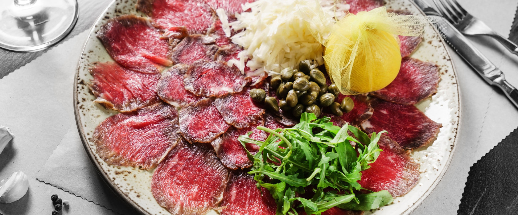 appetitliches Carpaccio, Glasbild Panorama