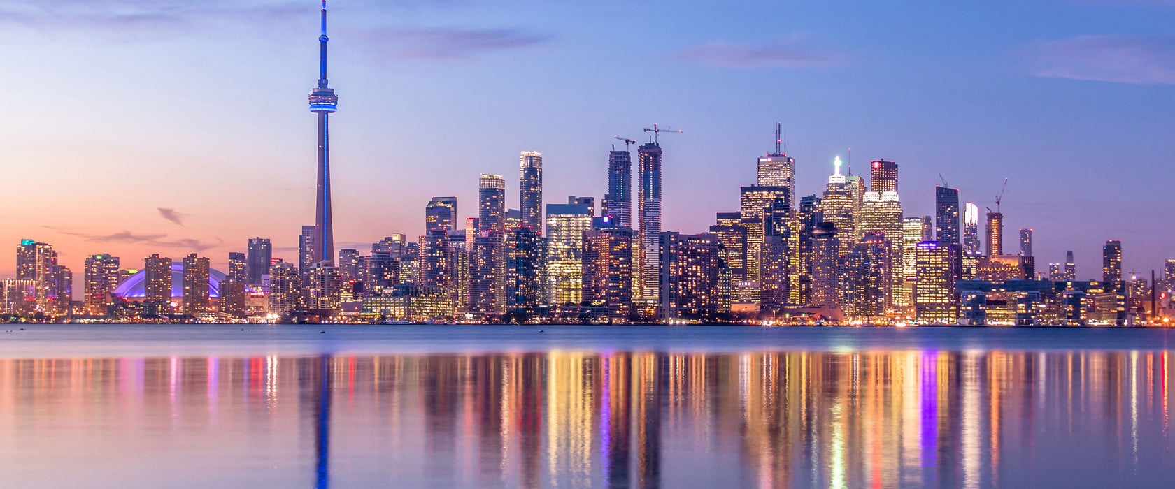 Skyline Toronto in der Abenddämmerung, Glasbild Panorama