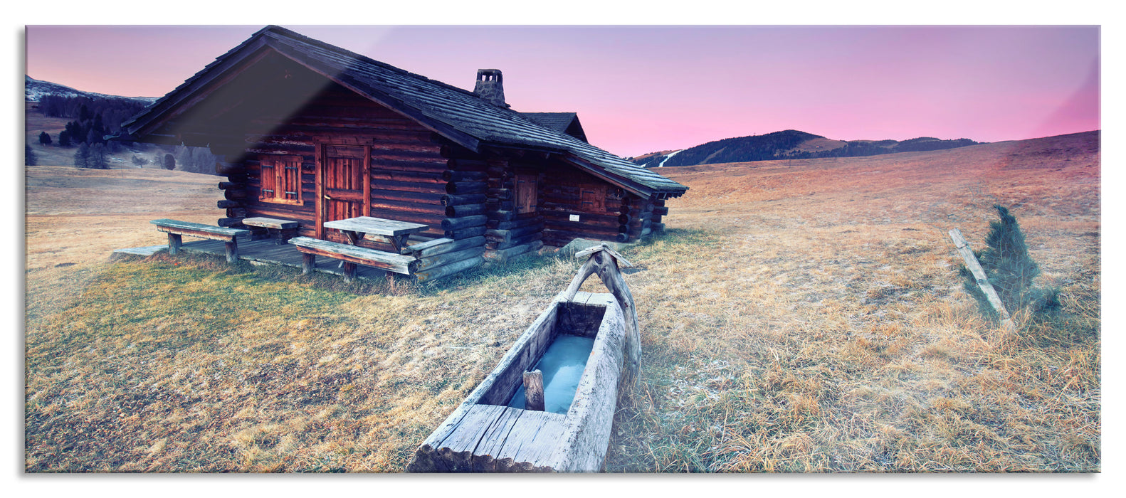 Pixxprint Blockhaus mit Wassertrog Dämmerung, Glasbild Panorama