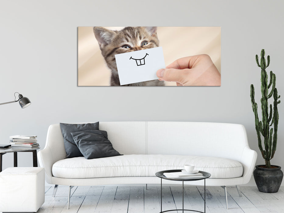 Lustige Katze mit Lächeln auf Papier, Glasbild Panorama