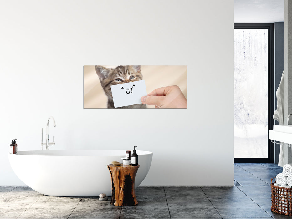 Lustige Katze mit Lächeln auf Papier, Glasbild Panorama