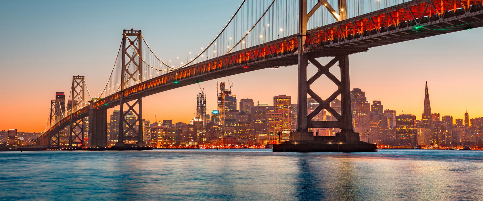 Oakland Bay Brücke bei Sonnenuntergang, Glasbild Panorama