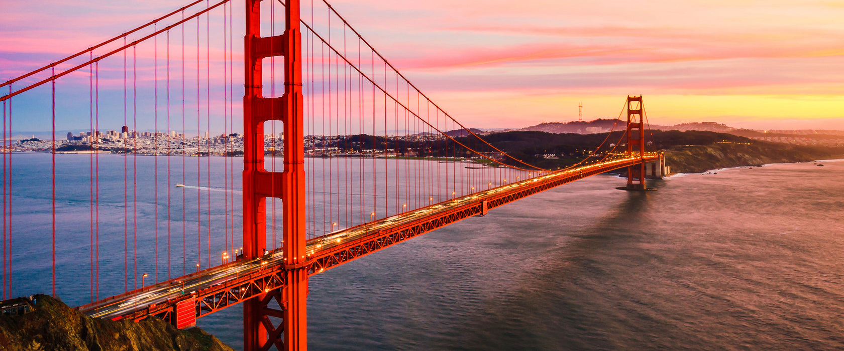 Golden Gate Bridge bei Sonnenuntergang, Glasbild Panorama