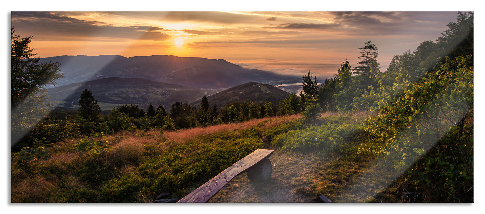 Pixxprint Bank auf Berggipfel bei Sonnenuntergang, Glasbild Panorama