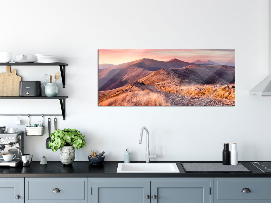 Steinlandschaft bei Sonnenuntergang, Glasbild Panorama