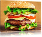 Köstlicher Burger auf Holztisch Leinwandbild