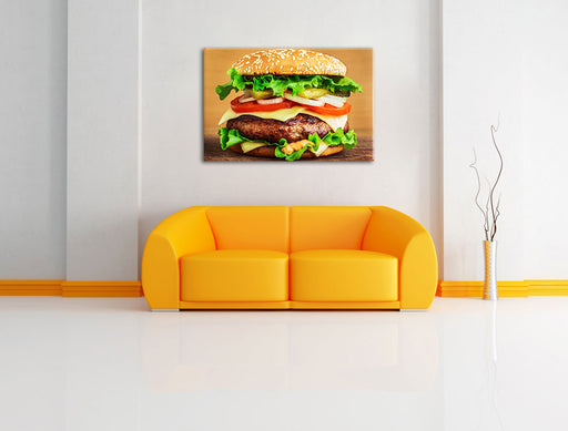 Köstlicher Burger auf Holztisch Leinwandbild über Sofa