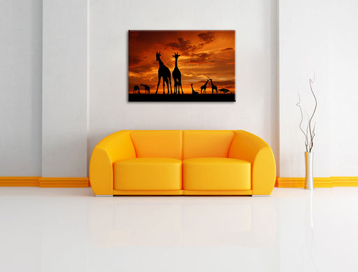 Afrika Giraffen im Sonnenuntergang Leinwandbild über Sofa