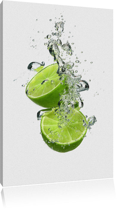 Pixxprint Leckere grüne Limetten im Wasser, Leinwandbild