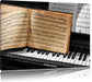 Notenbuch auf Piano Leinwandbild