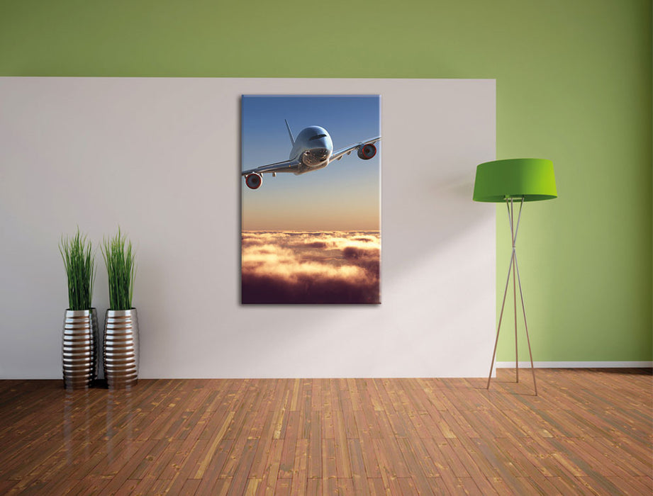 Flugzeug über den Wolken Leinwandbild im Flur
