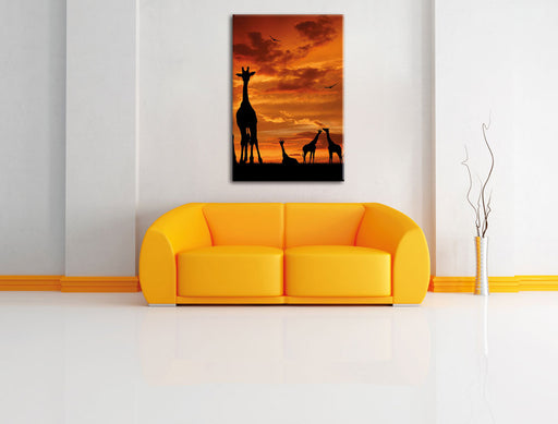 Afrika Giraffen im Sonnenuntergang Leinwandbild über Sofa