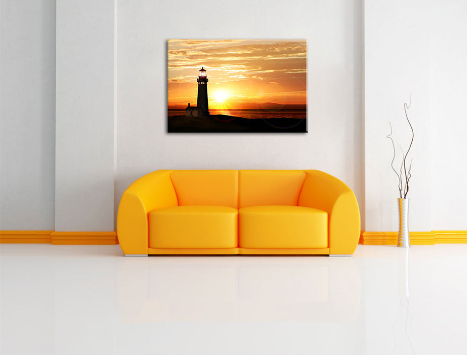 Leuchtturm im Sonnenuntergang Leinwandbild über Sofa