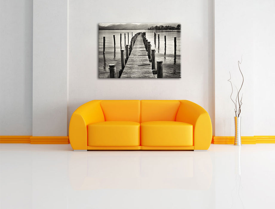 Langer Holzsteg ins Meer Leinwandbild über Sofa