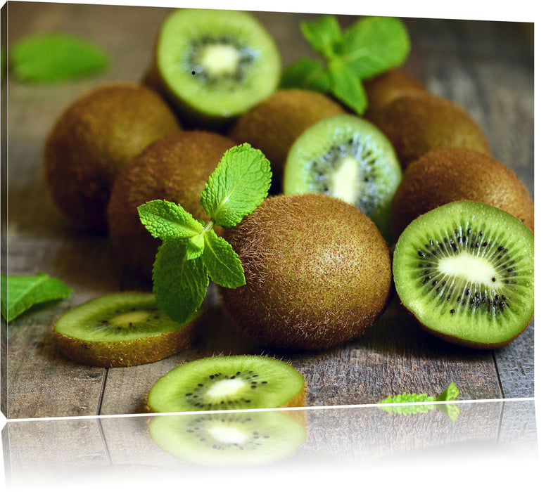 Pixxprint Kiwis auf Holztisch, Leinwandbild