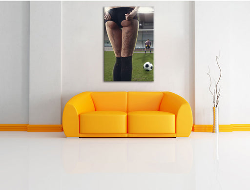 Frauenpo im Fußballtrikot Leinwandbild über Sofa