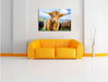 Blick einer Kuh an der Weide Leinwandbild über Sofa