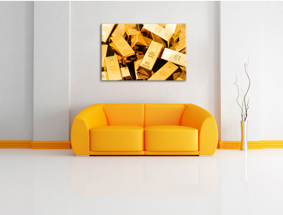 Eine Menge an Goldbarren Leinwandbild über Sofa