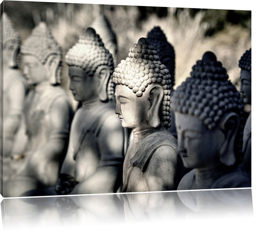 Buddha-Statuen in einer Reihe Leinwandbild