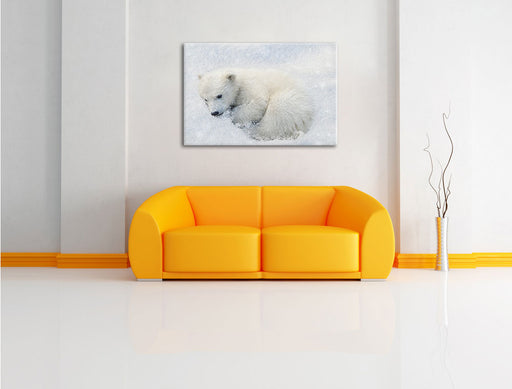 Eisbär im Schnee Leinwandbild über Sofa