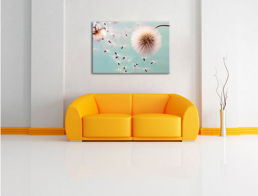 Pusteblumen in Bewegung Leinwandbild über Sofa