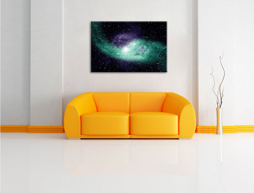 ferne Galaxie im Sternenstaub Leinwandbild über Sofa