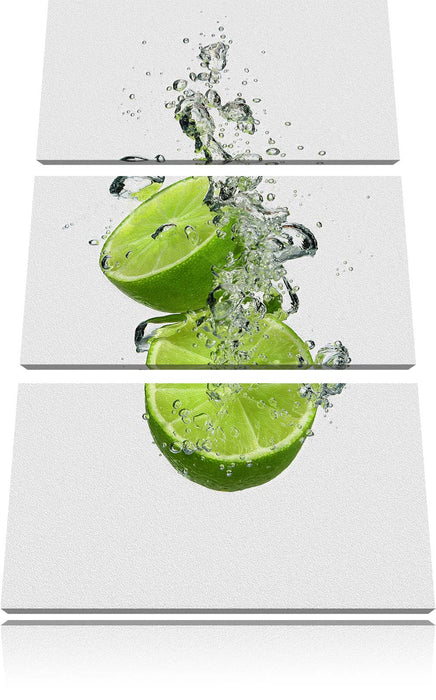 Leckere grüne Limetten im Wasser Leinwandbild 3 Teilig