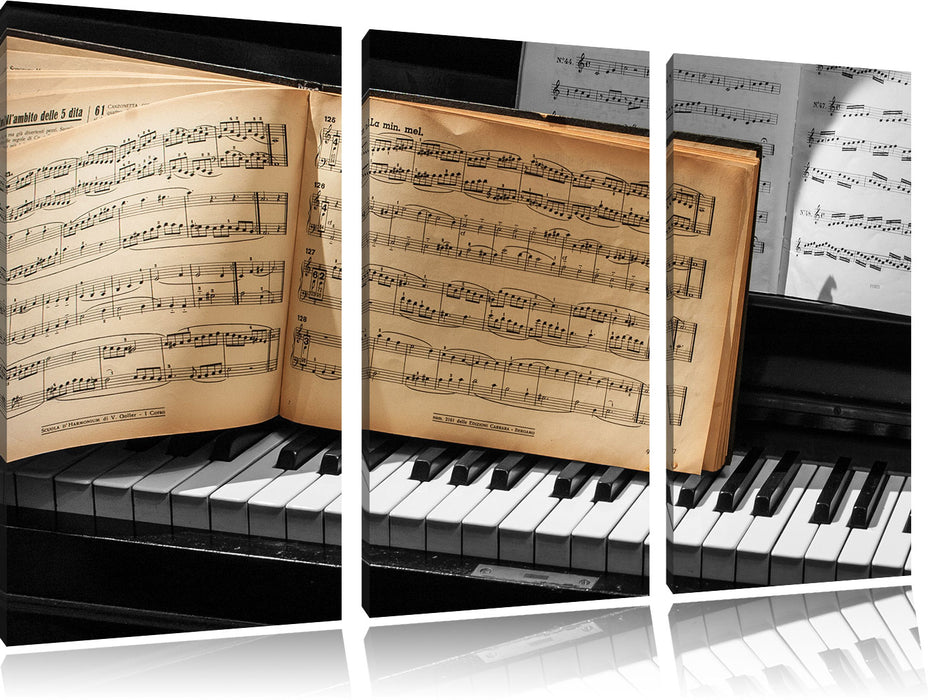 Notenbuch auf Piano Leinwandbild 3 Teilig