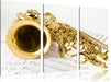 Saxophon auf Notenpapier Leinwandbild 3 Teilig