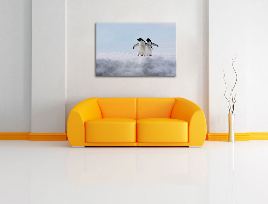 Adeliepinguine auf Eisscholle Leinwandbild über Sofa